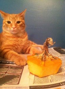 cute cat picture, cat carving pumpkins, obese cat eats entire pumpkin